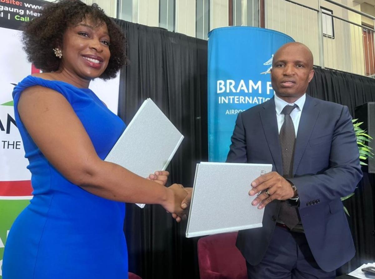 ACSA General Manager, Faith Zwane alongside MMM City Manager, Sello More at the MOU signing held at the Bram Fischer Airport. Picture by: Dineo Mokhoa 